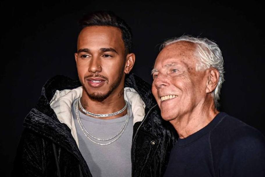 Giornata di show e moda a Milano per Lewis Hamilton, presente alle sfilate femminili per le collezioni di Armani (qui con lui nella foto) della primavera-estate 2018. LaPresse